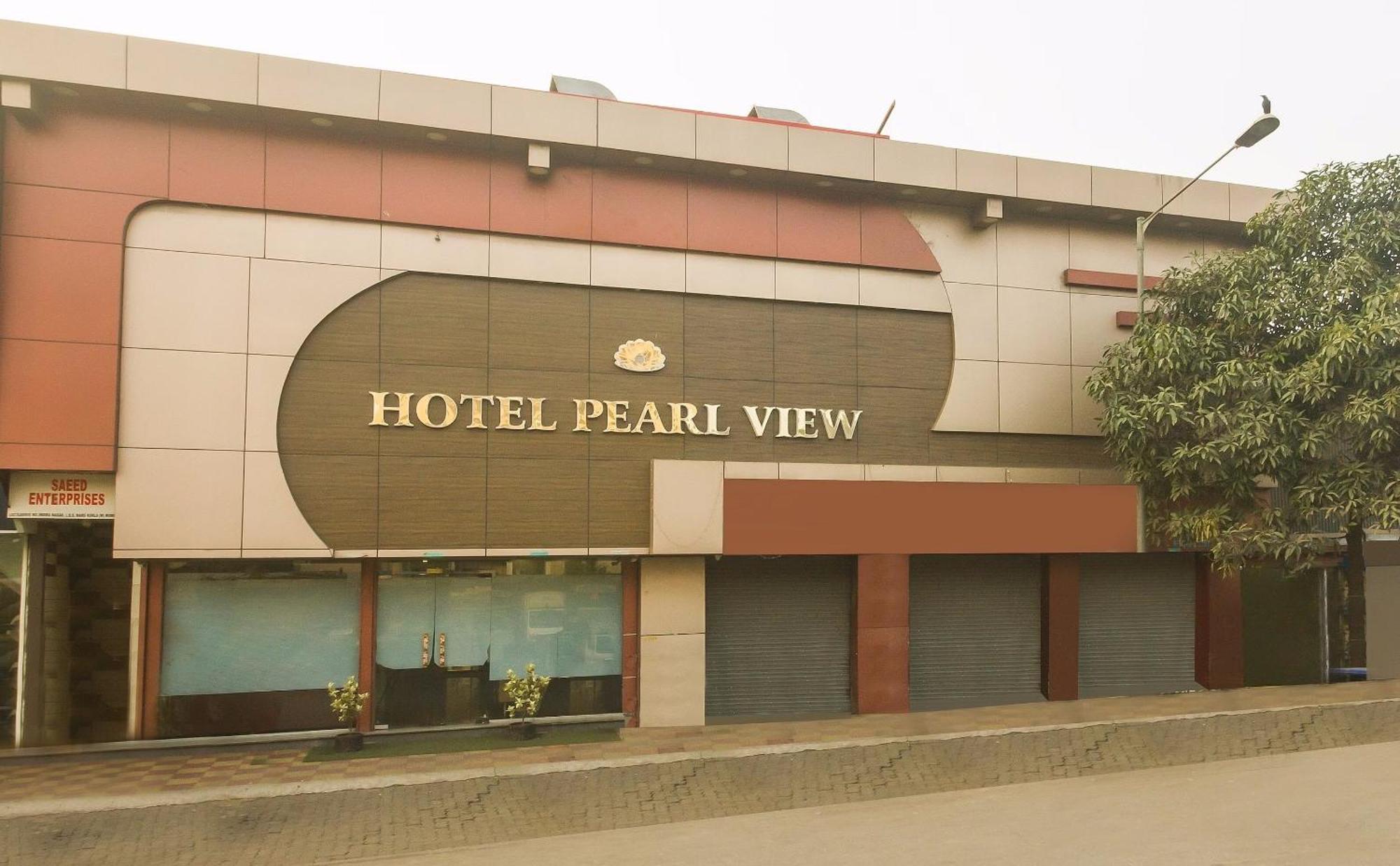 Capital O Hotel Pearl Near Us Embassy Mumbai Exterior photo